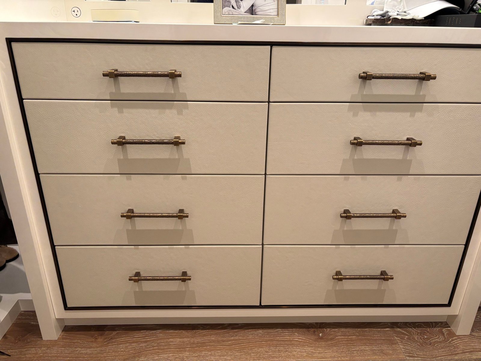 White dresser with bronze pulls assembled and installed, NYC