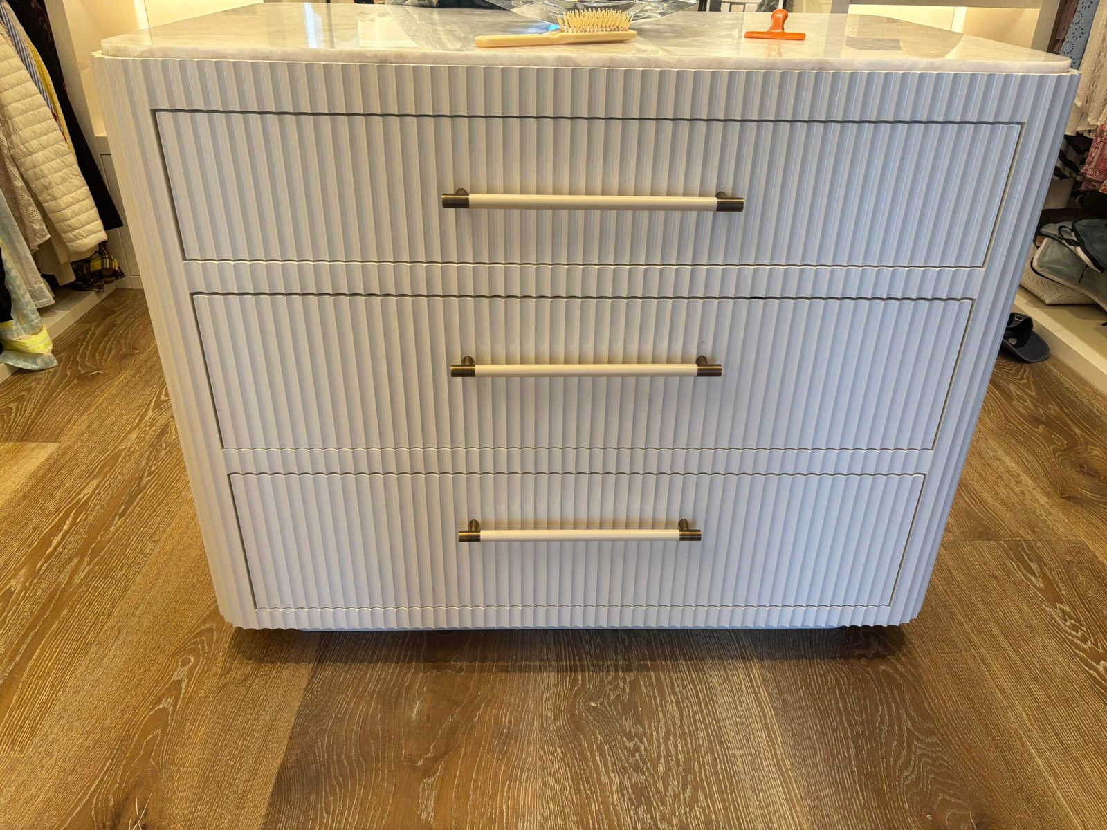 White fluted dresser with brass handles assembled, NYC