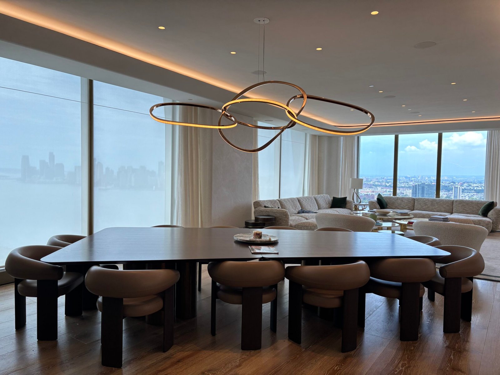Dining room with large table and chairs in a high-rise apartment, NYC