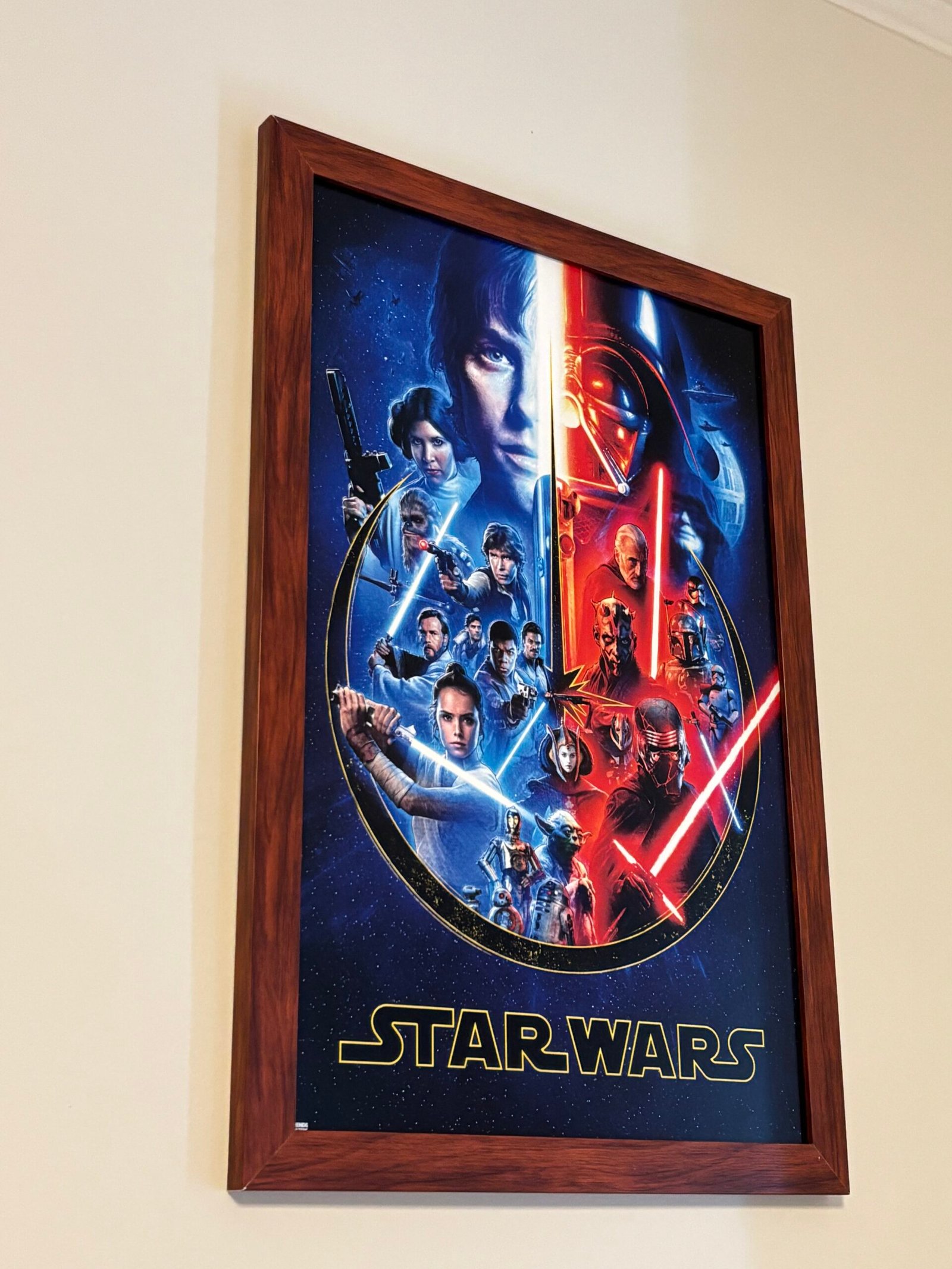 Large framed Star Wars poster hung on a wall, NYC